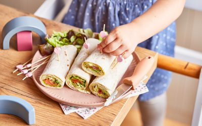 Toddler's Motor Cooking Skills, young girl making wraps